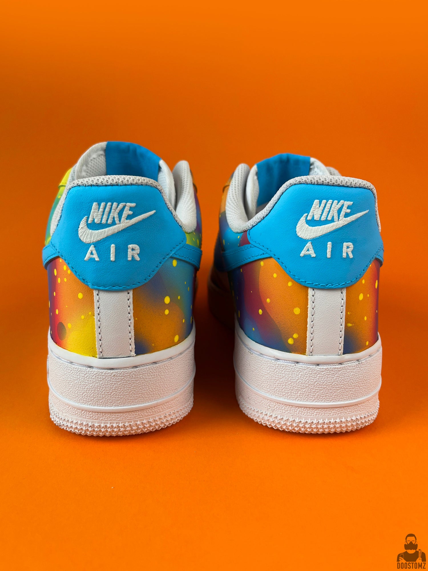 Nike Air Force 1 Color Splash Custom sneakers viewed from the back with colorful hand-painted design