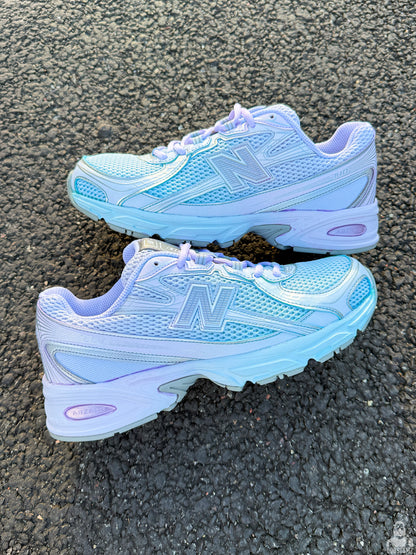 New Balance 740 Gradient Dye Custom sneakers showing blue and lavender gradient and detailed upper