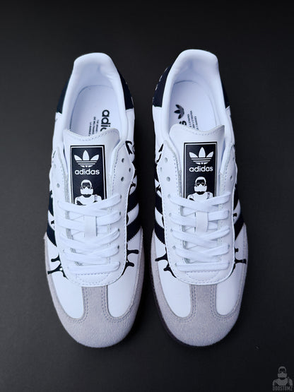 Custom Adidas Samba sneakers shown from above with black drip details and DOOSTOMZ tongue labels