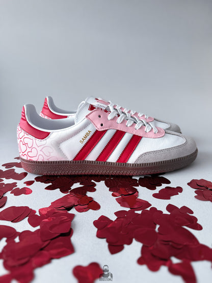 Custom Adidas Samba sneakers with pink and red accents and hand-painted heart details
