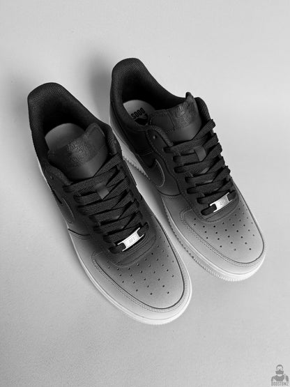Black and white Nike Air Force 1 custom sneakers viewed from above