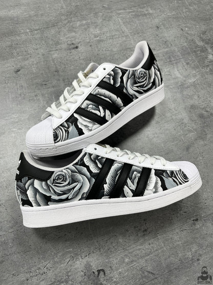 Hand-painted Adidas Superstar Black & White Roses Custom sneakers featuring realistic black and white roses across the upper