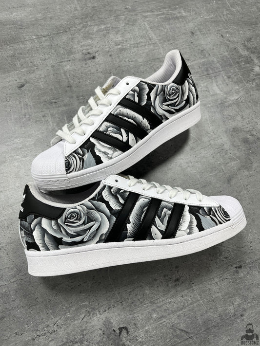 Hand-painted Adidas Superstar Black & White Roses Custom sneakers featuring realistic black and white roses across the upper