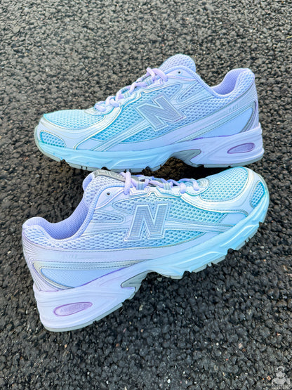 New Balance 740 custom sneakers with blue and lavender gradient dye, side view